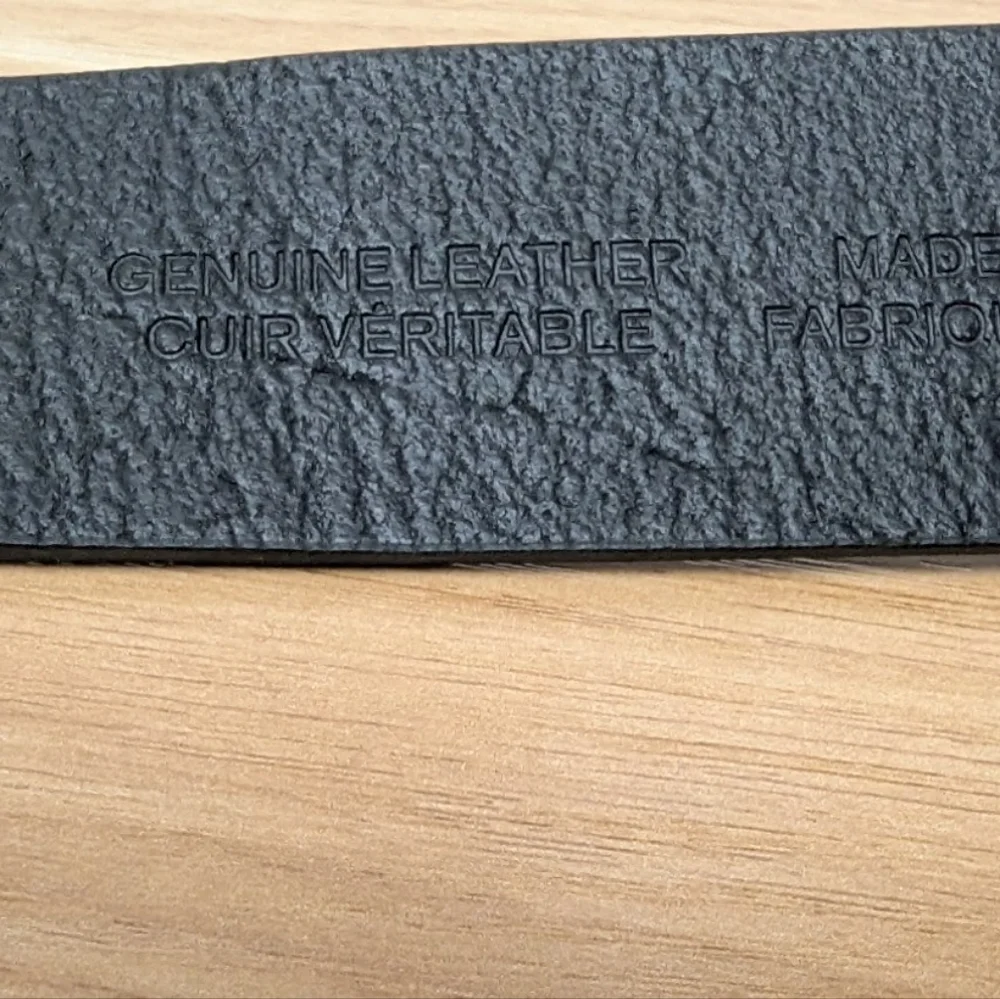 Black genuine leather belt in used condition